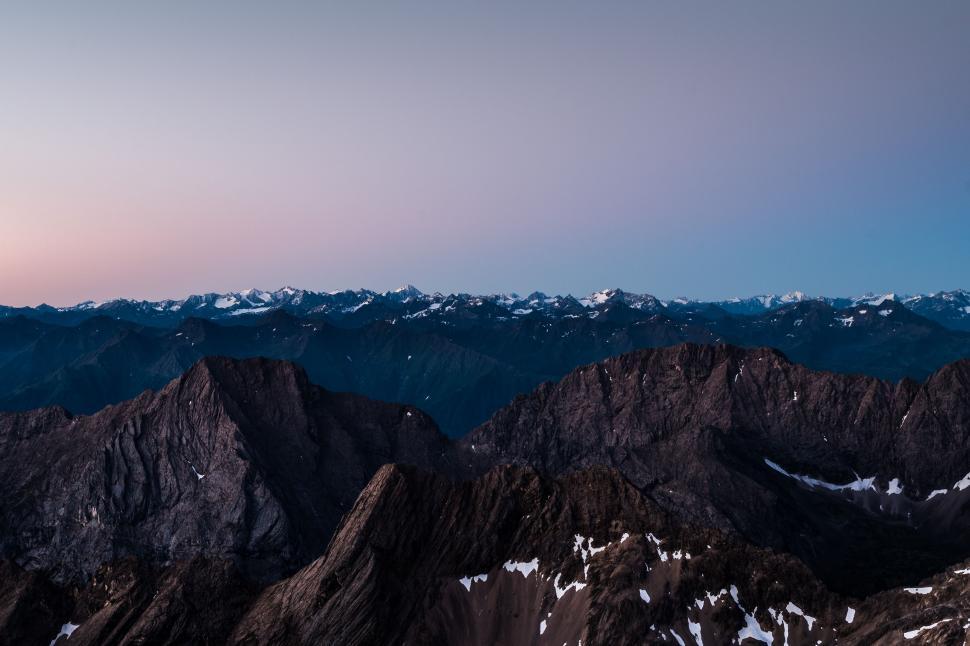 Free Image of A View of a Mountain Range From a Plane 