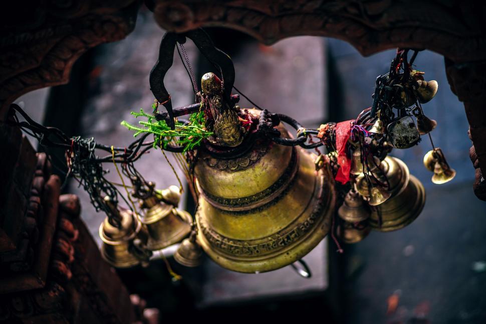 Free Image of Group of Bells Hanging From a Ceiling 