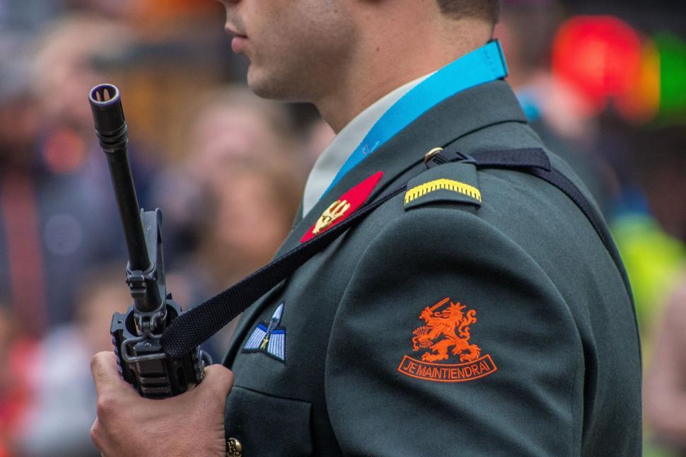 Free Image of Armed Military Man Standing Vigilant 