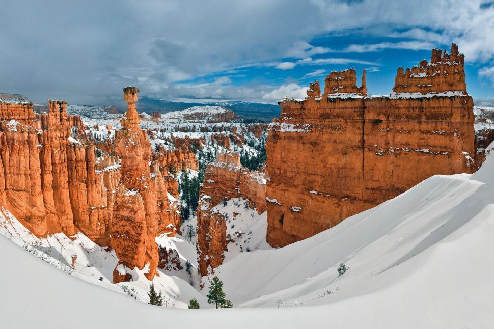Free Image of Majestic Snow Covered Mountain With Sky Background 