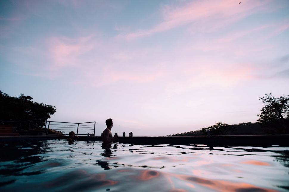 Free Image of Person Sitting in Pool of Water 