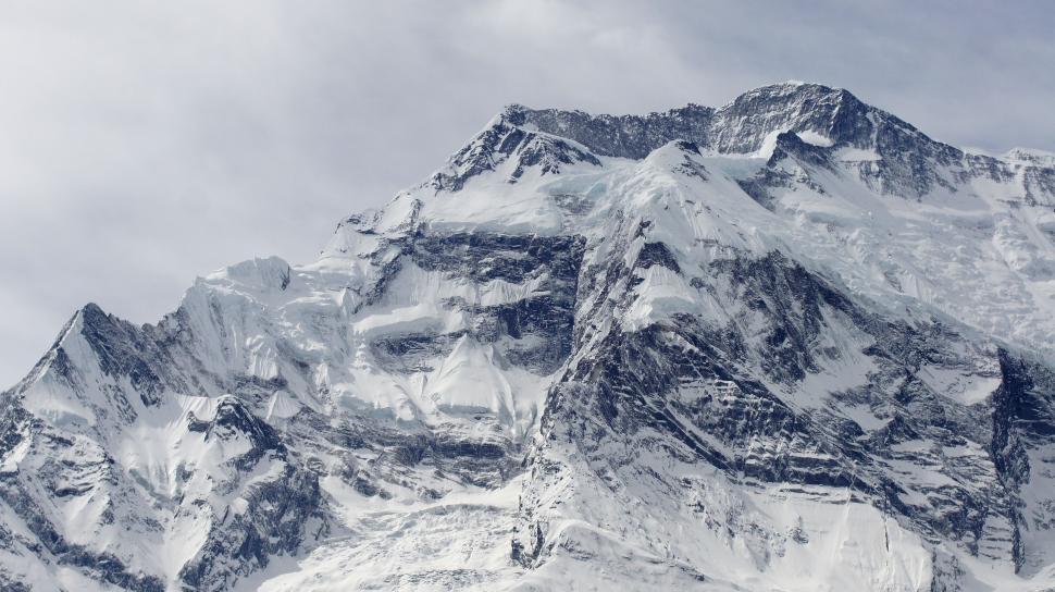 Free Image of Snow Covered Mountain With Sky Background 