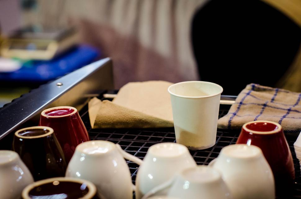 Free Image of Coffee maker warming cups 