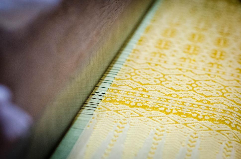 Free Image of Thai dresses fabric on loom  