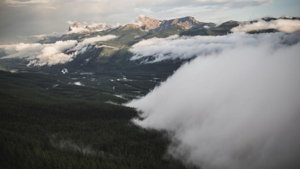 Free Image of Clouds Covering Mountain Range 