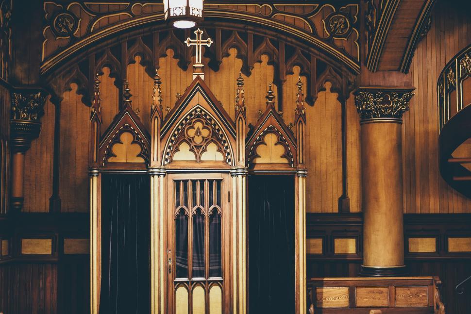 Free Image of Wooden Building With Cross Over Door 