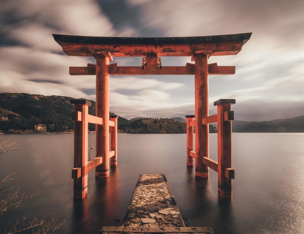 Free Image of Wooden Structure Over Body of Water 