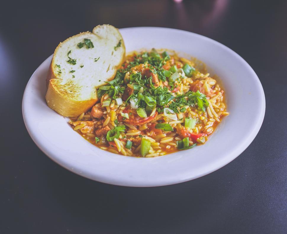 Free Image of Bowl of Food With Bread on Table 