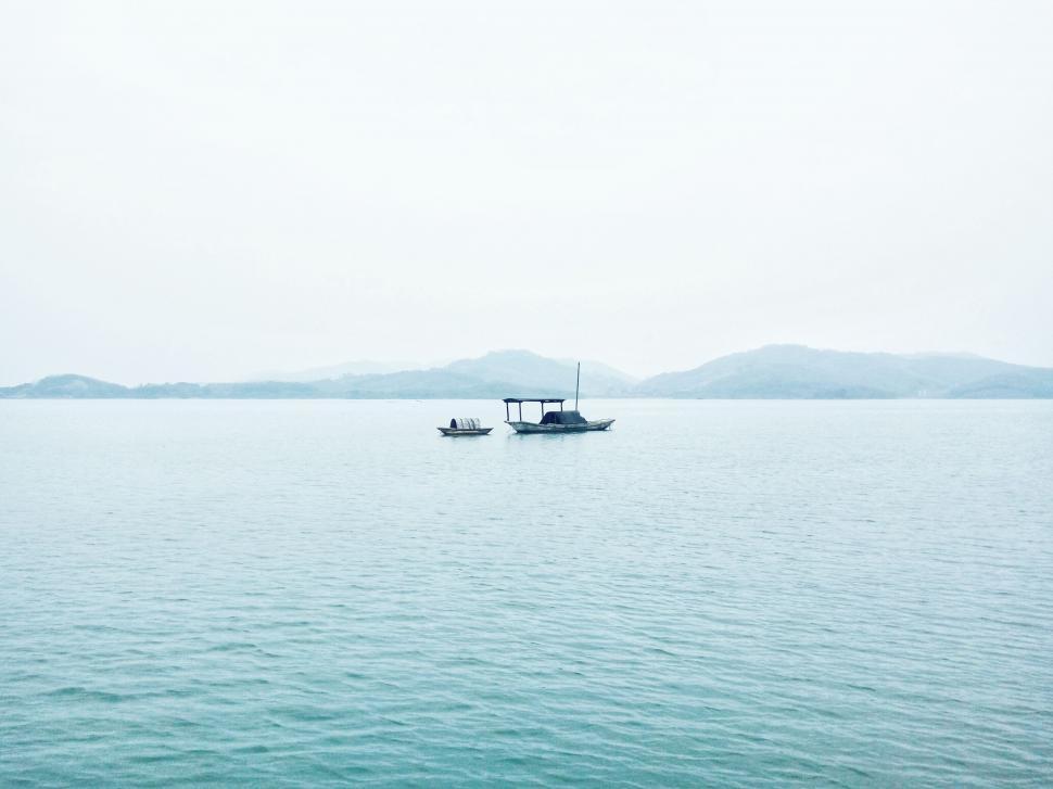 Free Image of Boats Floating on Large Body of Water 