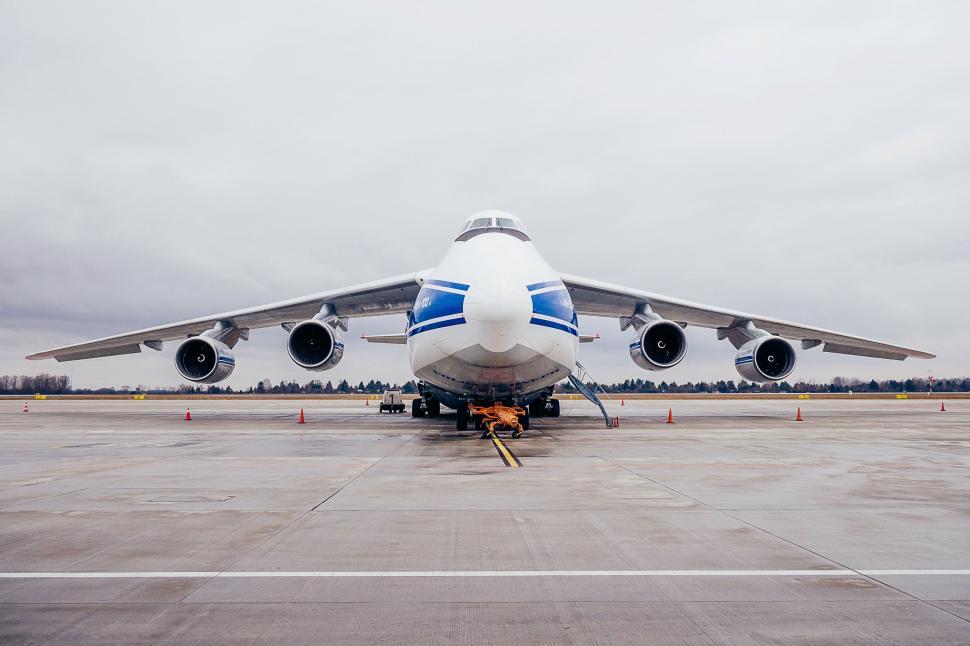 Free Image of Large Jetliner Parked on Airport Tarmac 