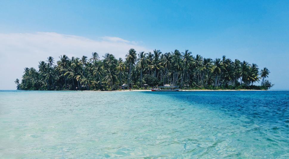 Free Image of Small Island in the Middle of the Ocean 