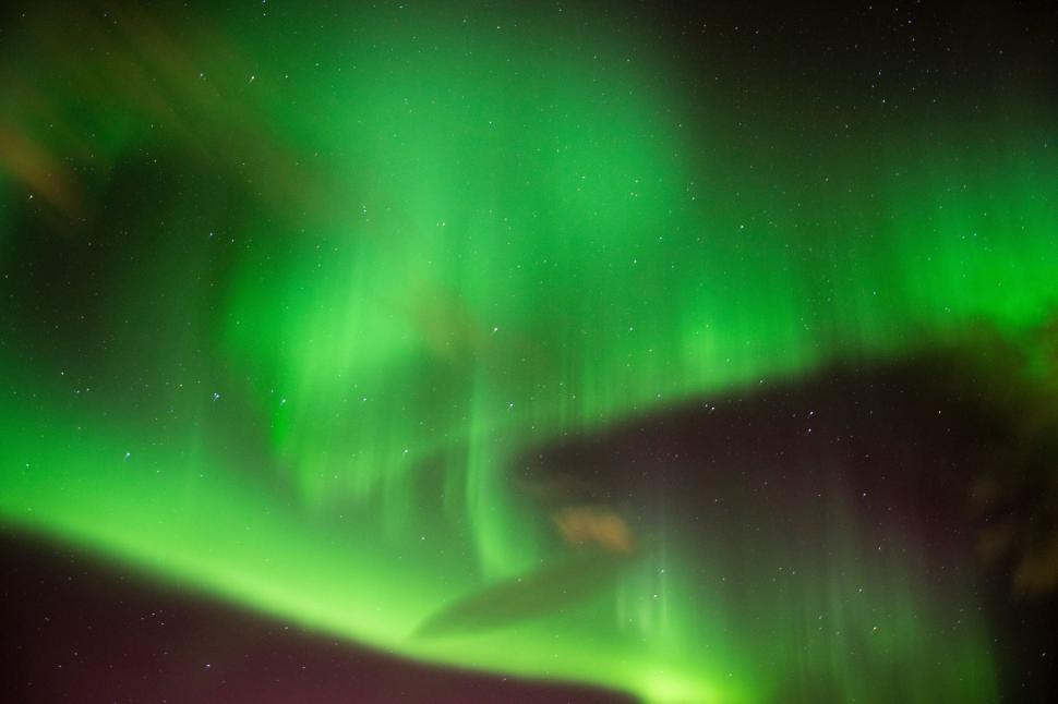 Free Image of Green and Purple Aurora Borealis in Night Sky 