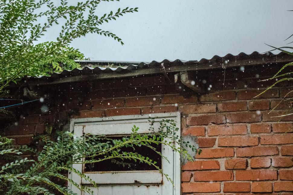 Free Image of Dilapidated Brick Building With Broken Window 