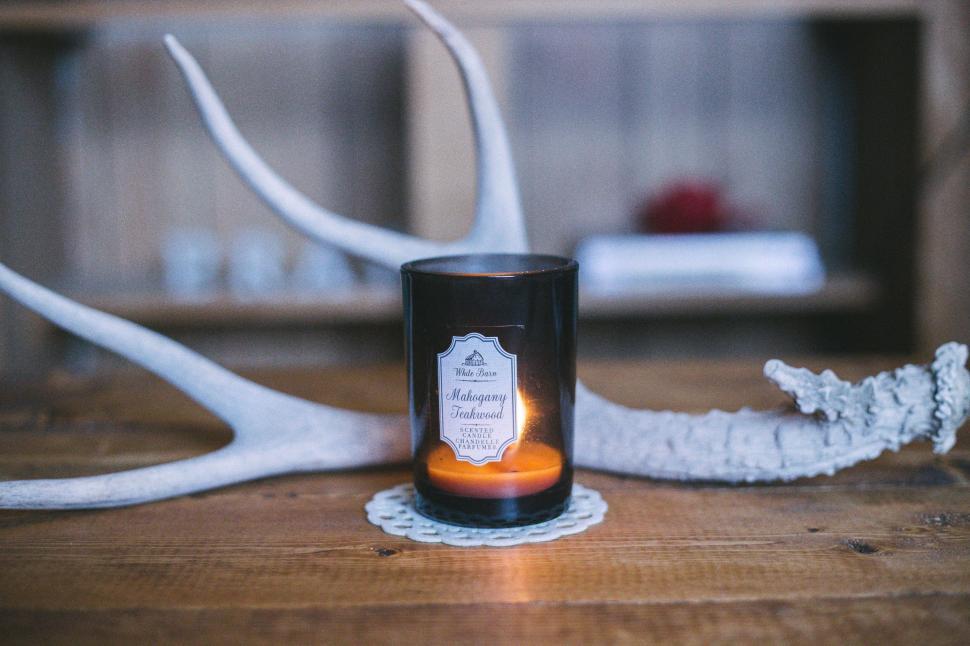 Free Image of Candle Illuminating Tabletop 