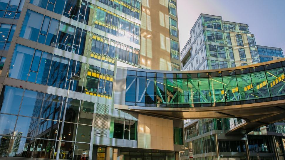 Free Image of Large Building With Glass Walkway 