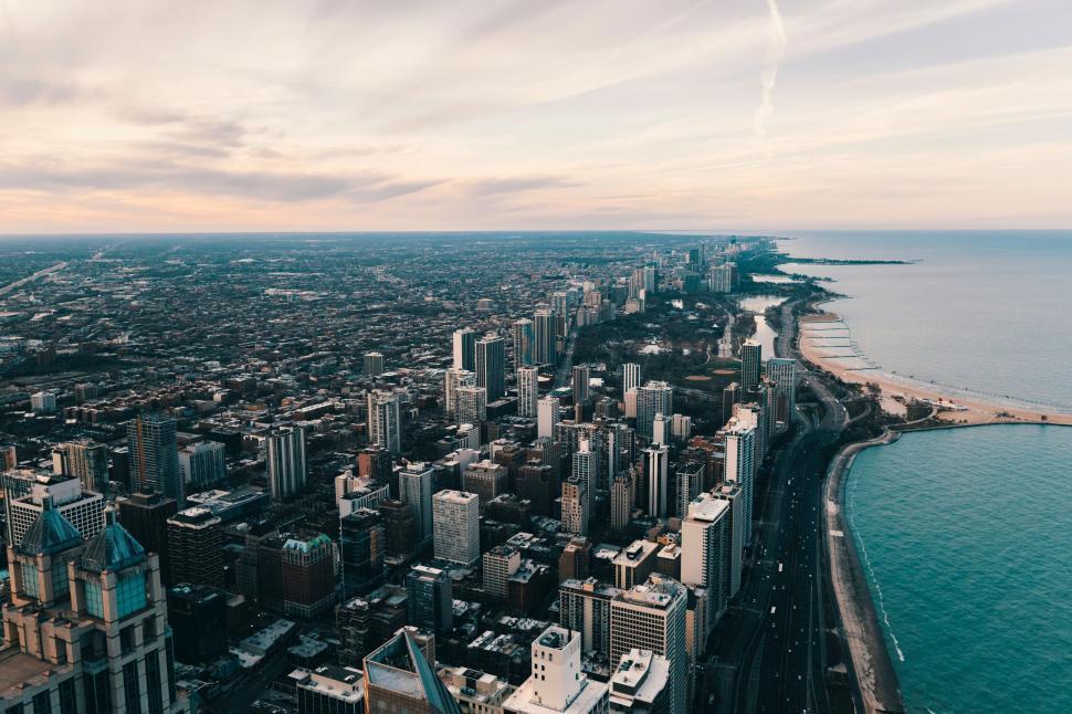 Free Image of Aerial View of a Large City by the Ocean 