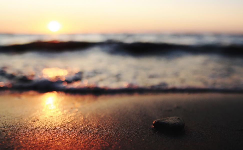 Free Image of Close Up of Rock on Beach by Ocean 