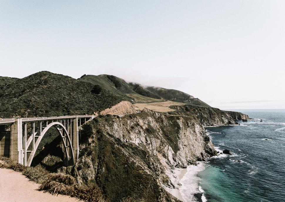 Free Image of Large Bridge Over a Large Body of Water 