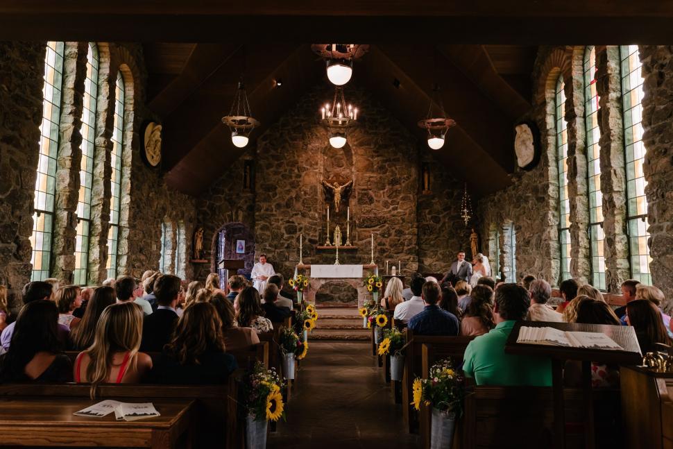 Free Image of Large Group of People Sitting in a Church 