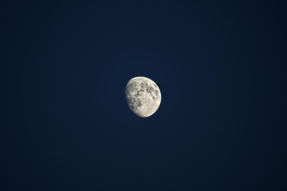 Free Image of Full Moon Illuminating Dark Blue Sky 