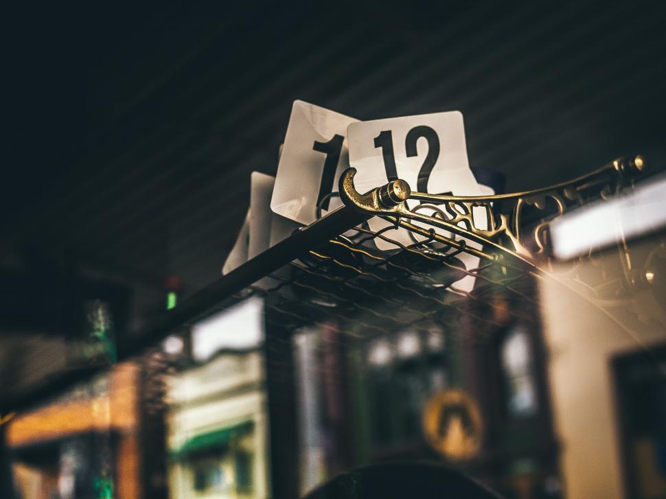 Free Image of Metal Rack With Clock Close Up 