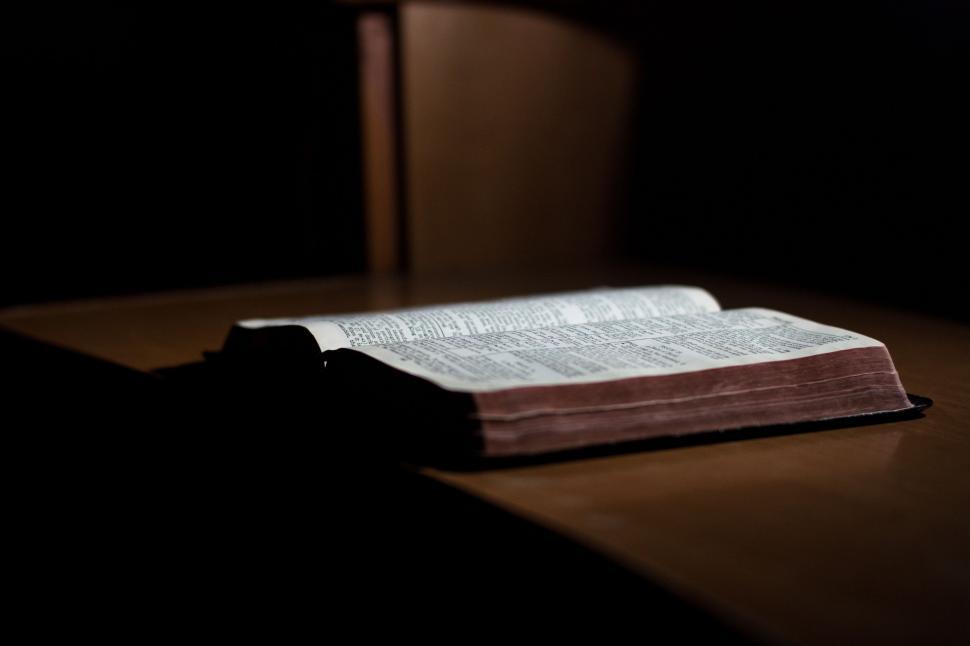 Free Image of Open Book on Wooden Table 