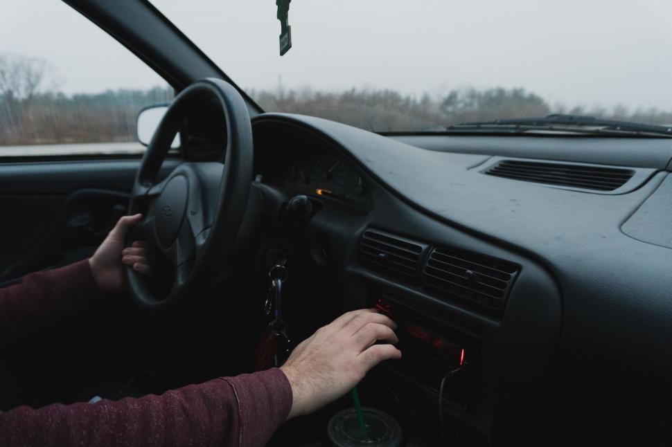 Free Image of Person Driving Car on Snowy Day 