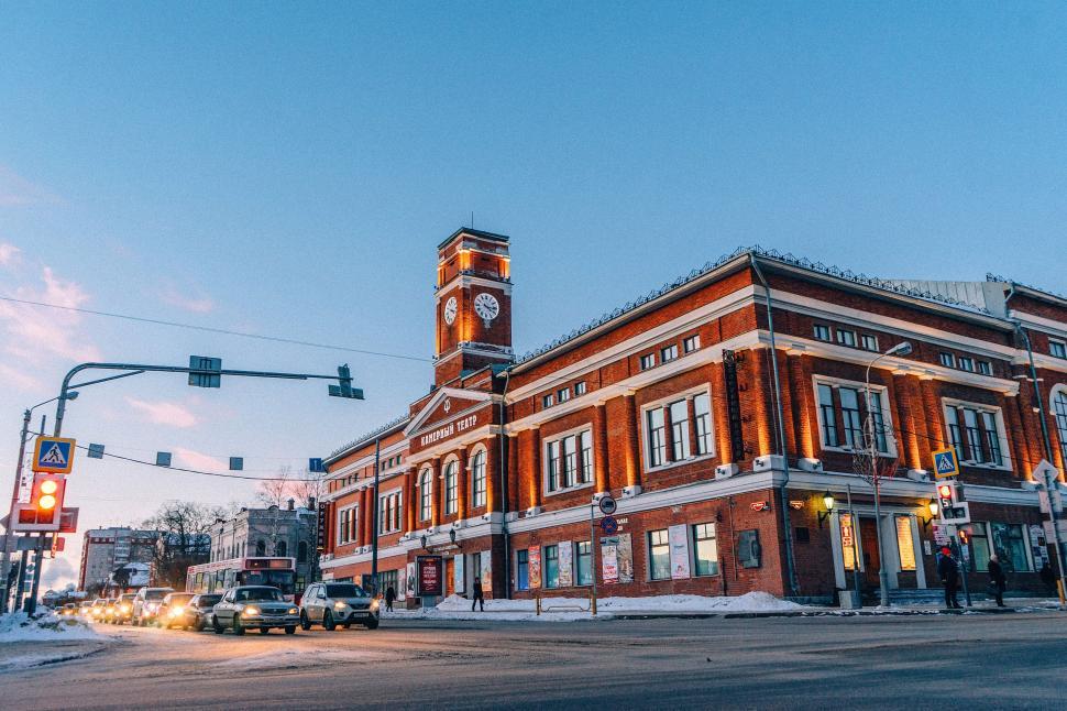 Free Image of Large Red Brick Building With Clock Tower 