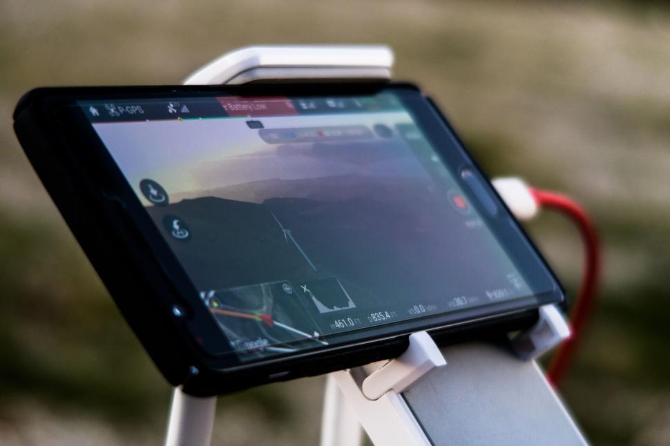 Free Image of Tablet on White Stand 