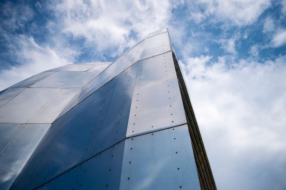 Free Image of Looking Up at the Side of a Tall Building 
