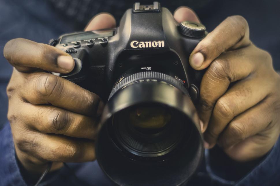 Free Image of Person Holding Camera 