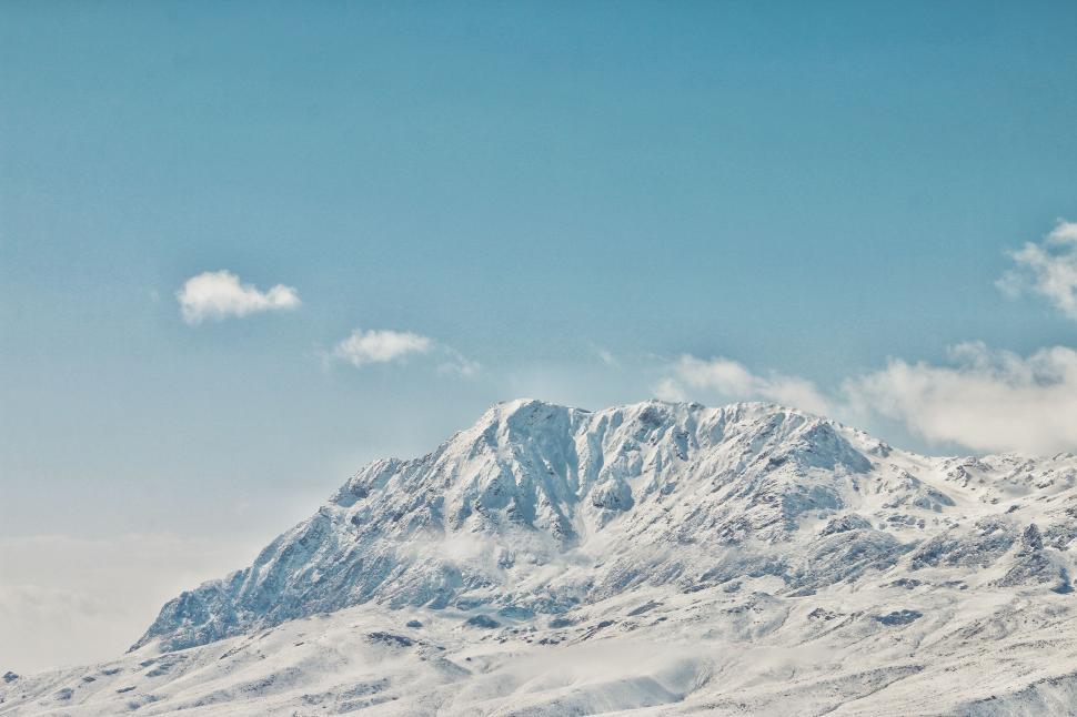 Free Image of Snowboarder Descending Snowy Mountain 