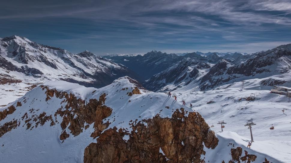 Free Image of Snowy Mountain Range Viewed From Mountain Summit 