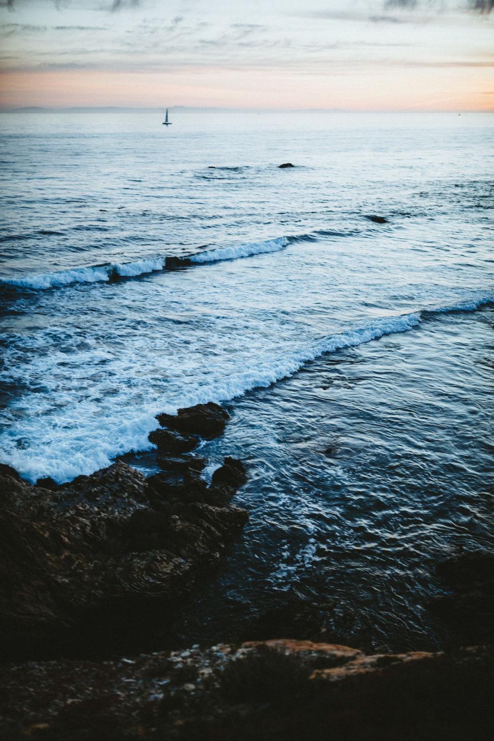 Free Image of Boat on Distant Waters 