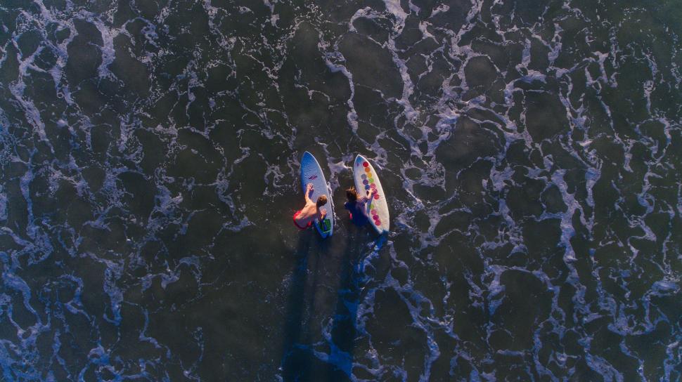 Free Image of Person Standing on Boat in Water 