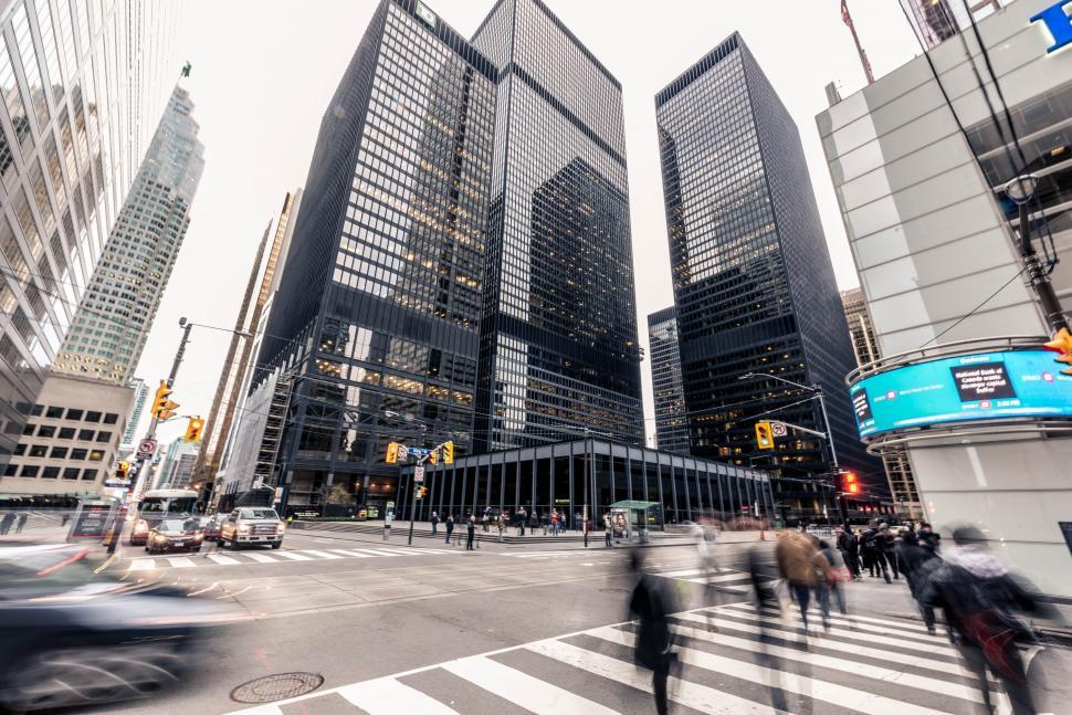 Free Image of Blurry Picture of People Crossing Street in City 