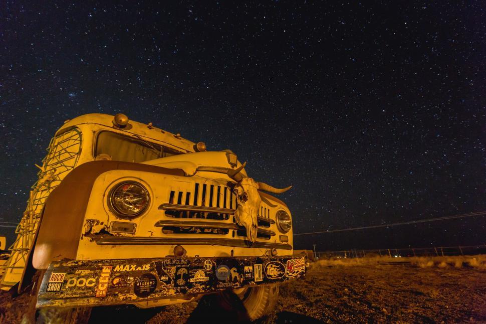Free Image of Yellow Truck Parked in Field 