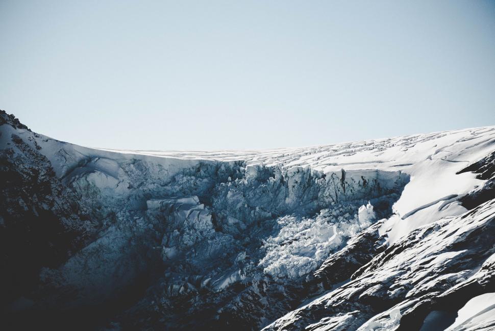 Free Image of Person Snowboarding in Snow 