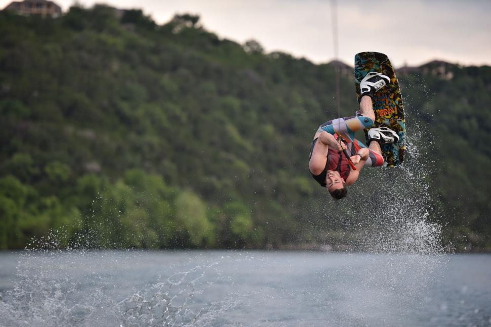 Free Image of Man Flying Through the Air on Board 