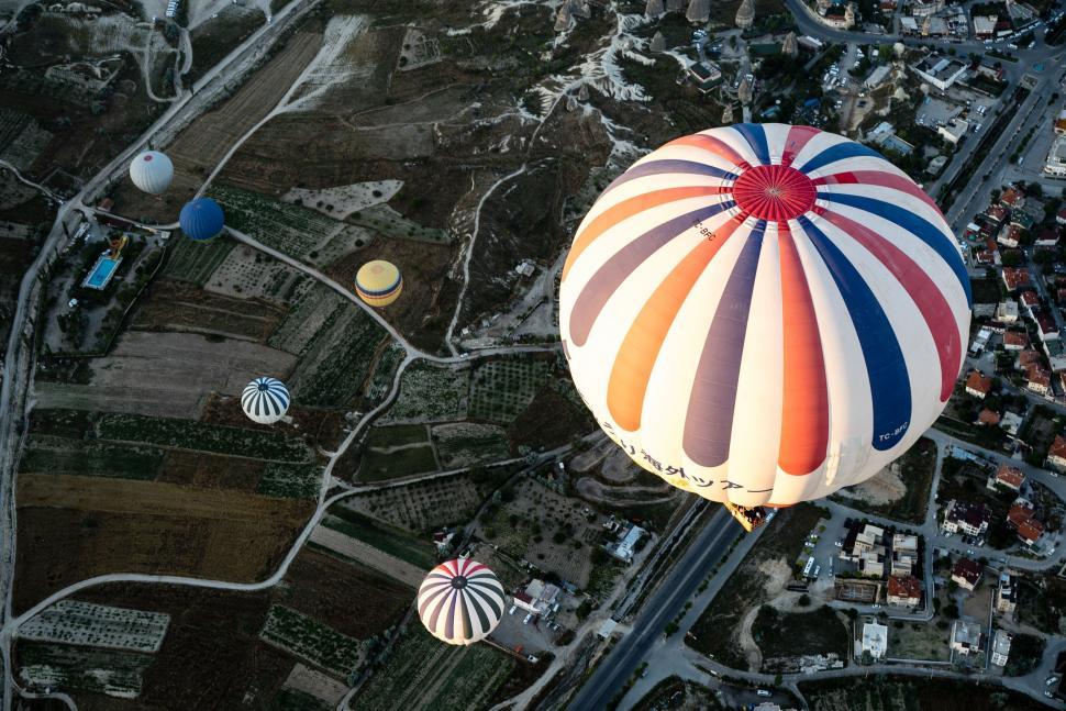 Free Image of Hot Air Balloon Flying Over City 