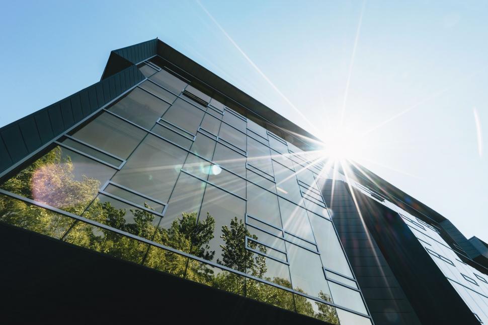 Free Image of Sun Shines Brightly Through Windows of Building 