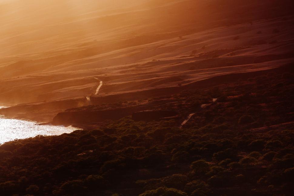 Free Image of Person Standing on Beach With Surfboard 