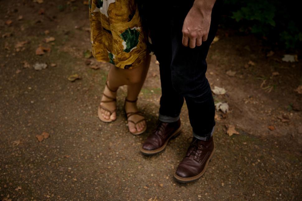 Free Image of Two People Standing Next to Each Other 