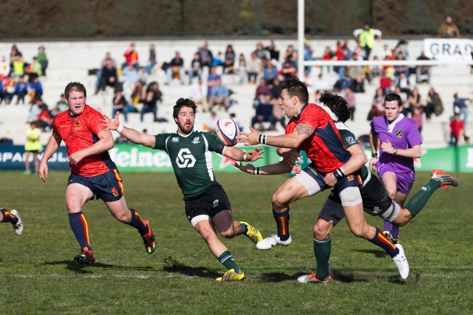 Free Image of Group of Men Playing a Game of Rugby 