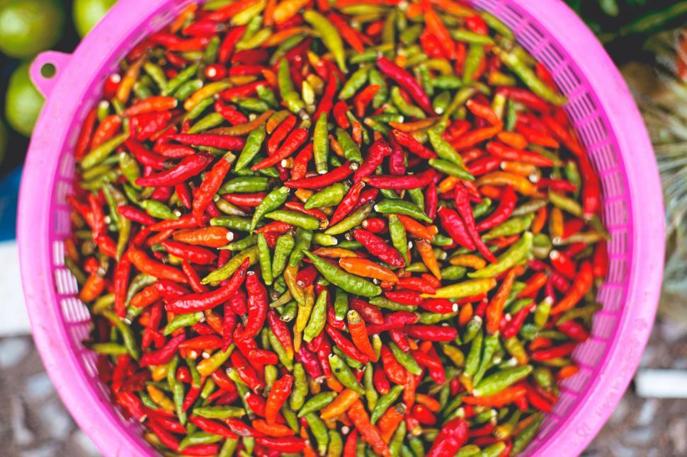 Free Image of Bucket Filled With Red and Green Peppers 