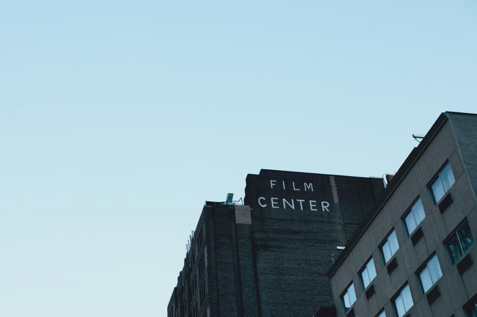 Free Image of Tall Building With Sign 