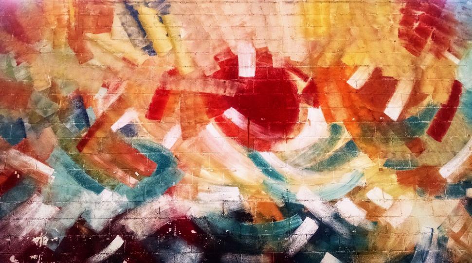 Free Image of Vibrant Painting on Brick Wall 