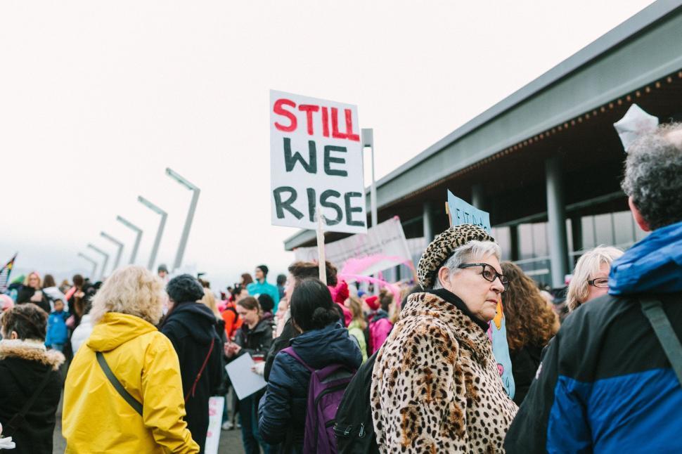Free Image of Crowd of People Standing Outside Building 