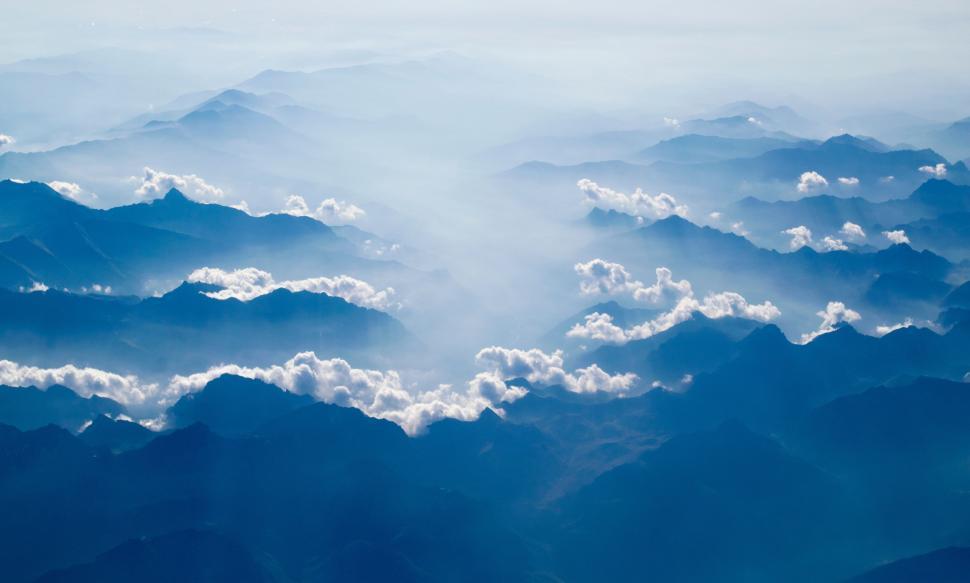 Free Image of Aerial View of Clouds From Airplane Window 
