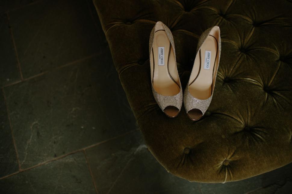 Free Image of Shoes on Green Chair 